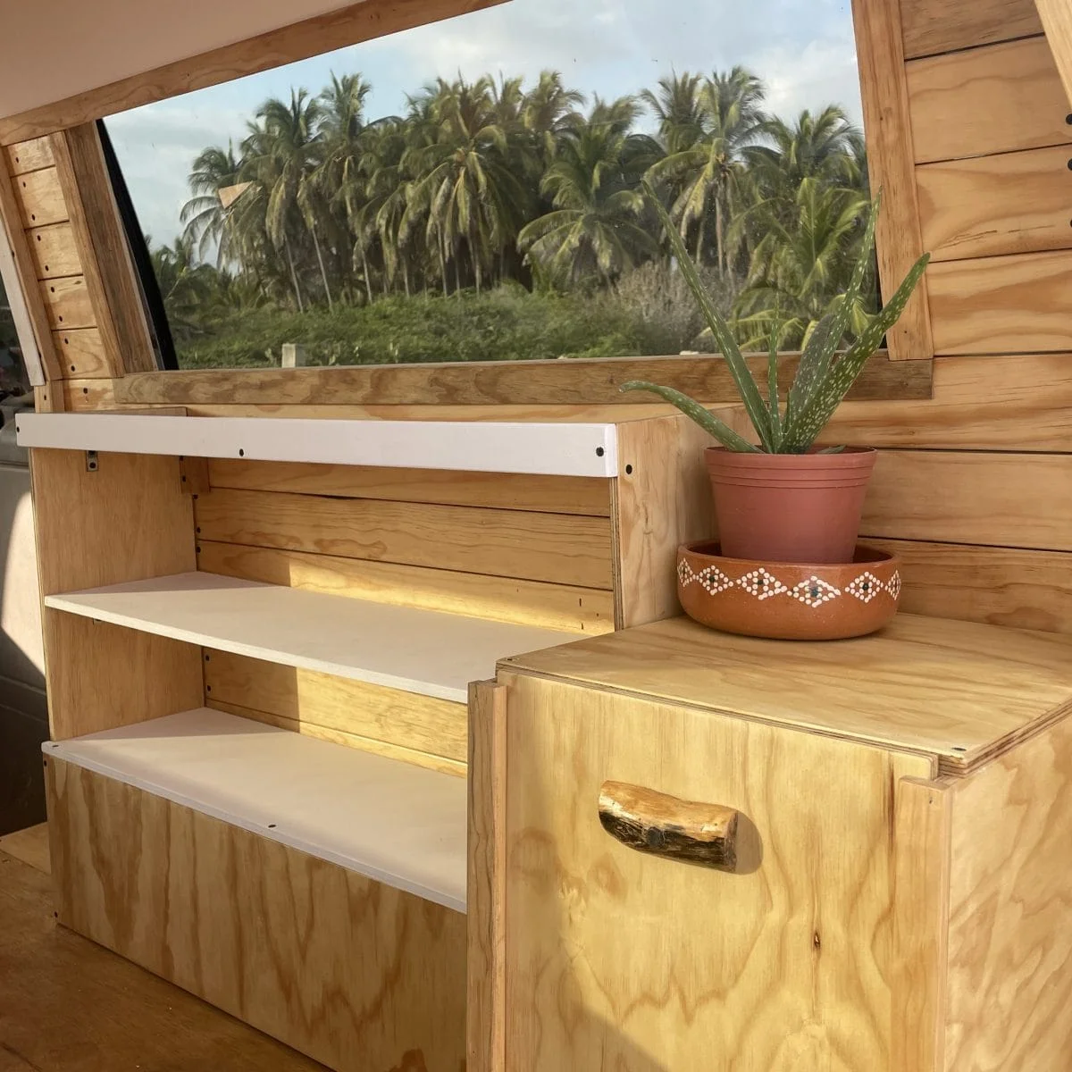 Wooden closet inside campervan
